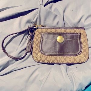 Brown coach monogram wristlet